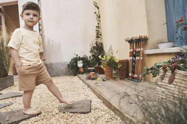 Boy standing outside 