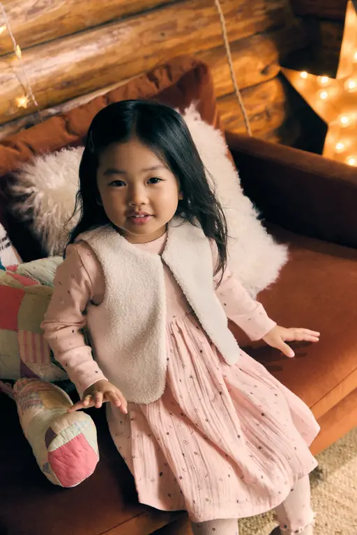 Girl sitting on sofa