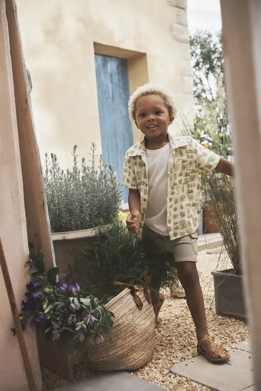 Boy standing in doorway