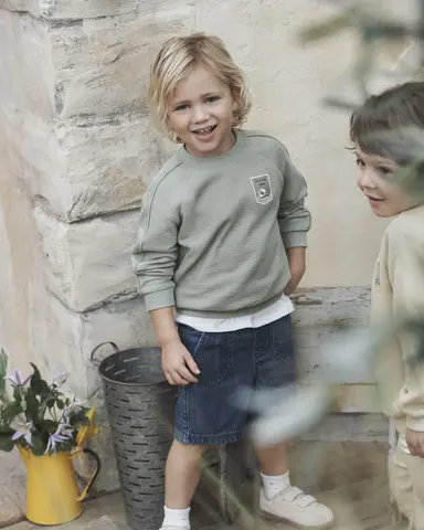 Kid standing outside